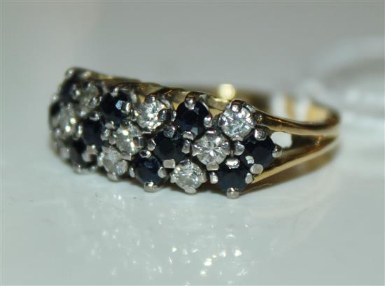 An 18ct gold, sapphire and diamond ring, size L.